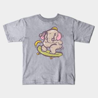 Asian elephant playing surf skate with banana Kids T-Shirt